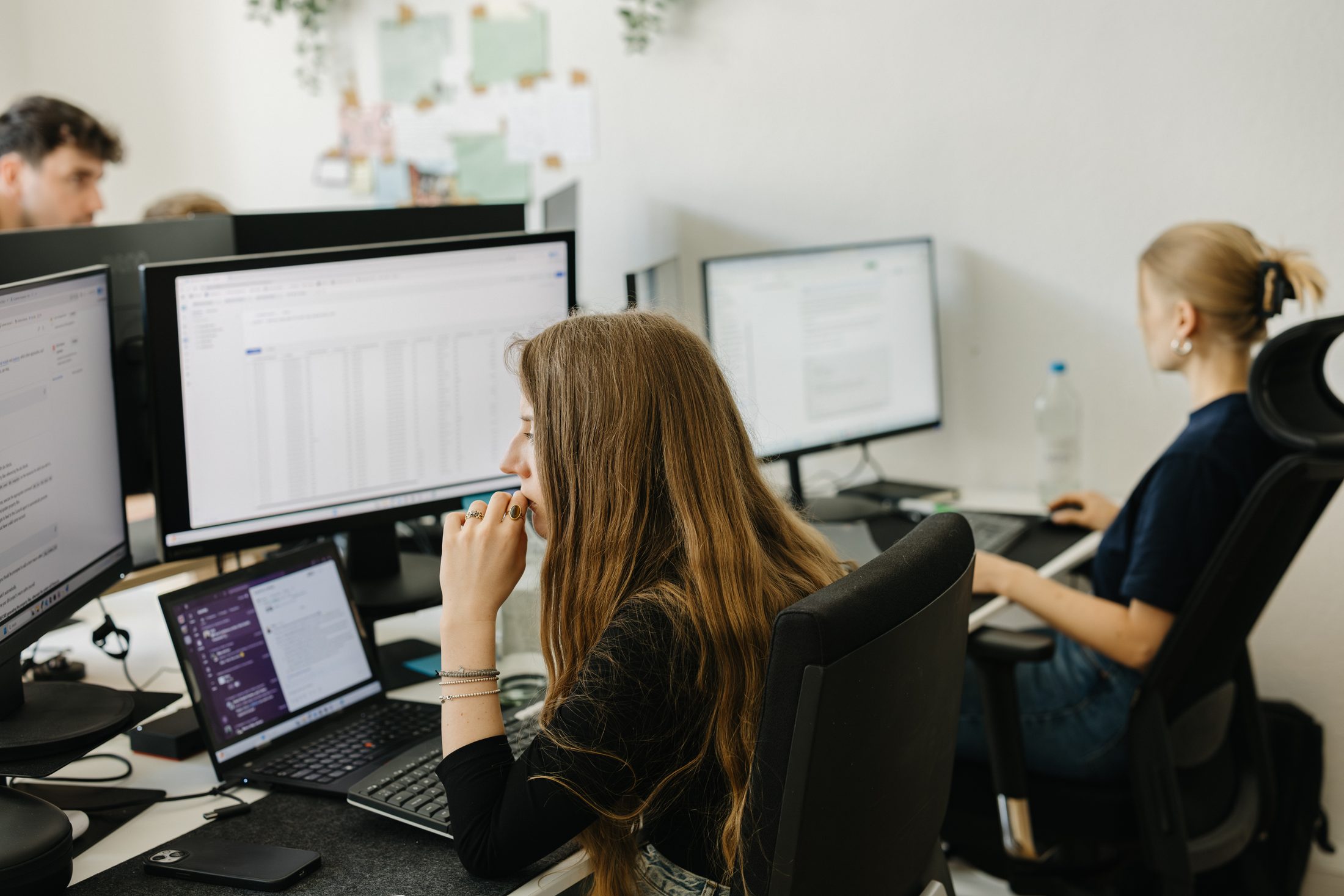 Gemmpions working at their desks